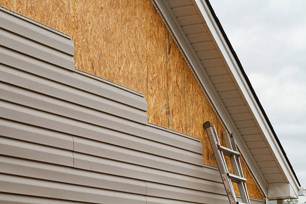 Professional Siding Repair technician working in Thomasville, PA